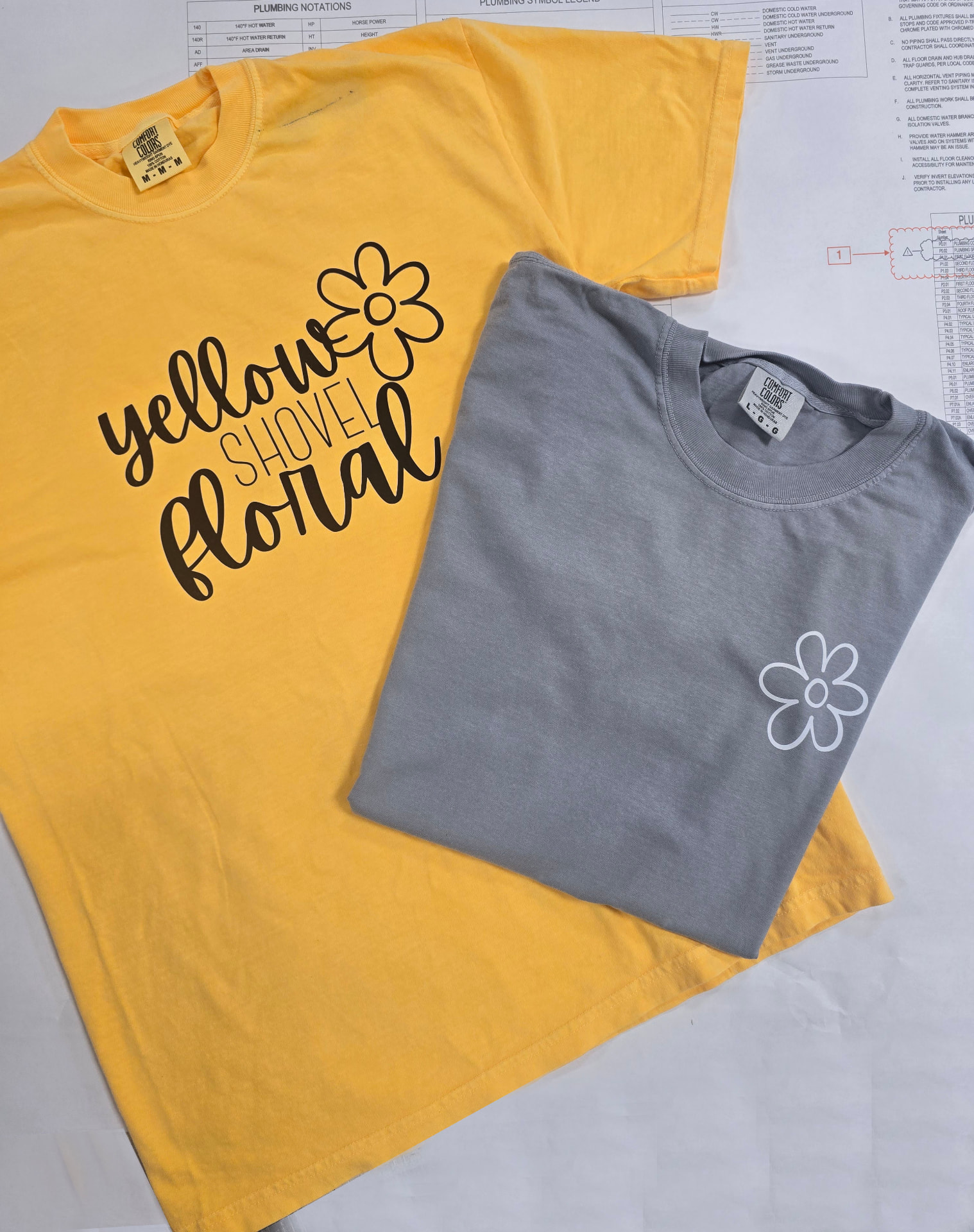 Custom screen printed t-shirts in yellow and grey